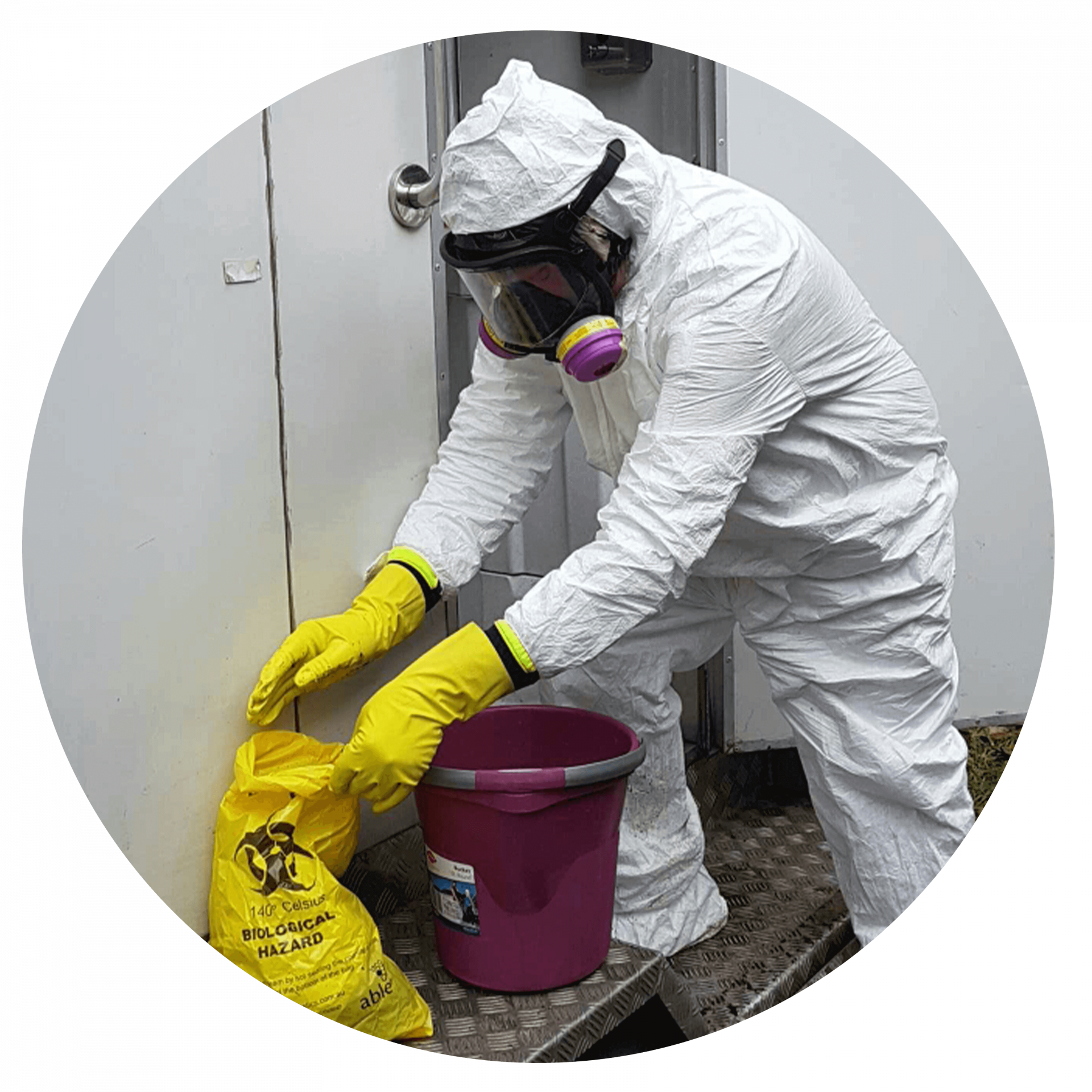 Person is hazmat suit and biohazard bag