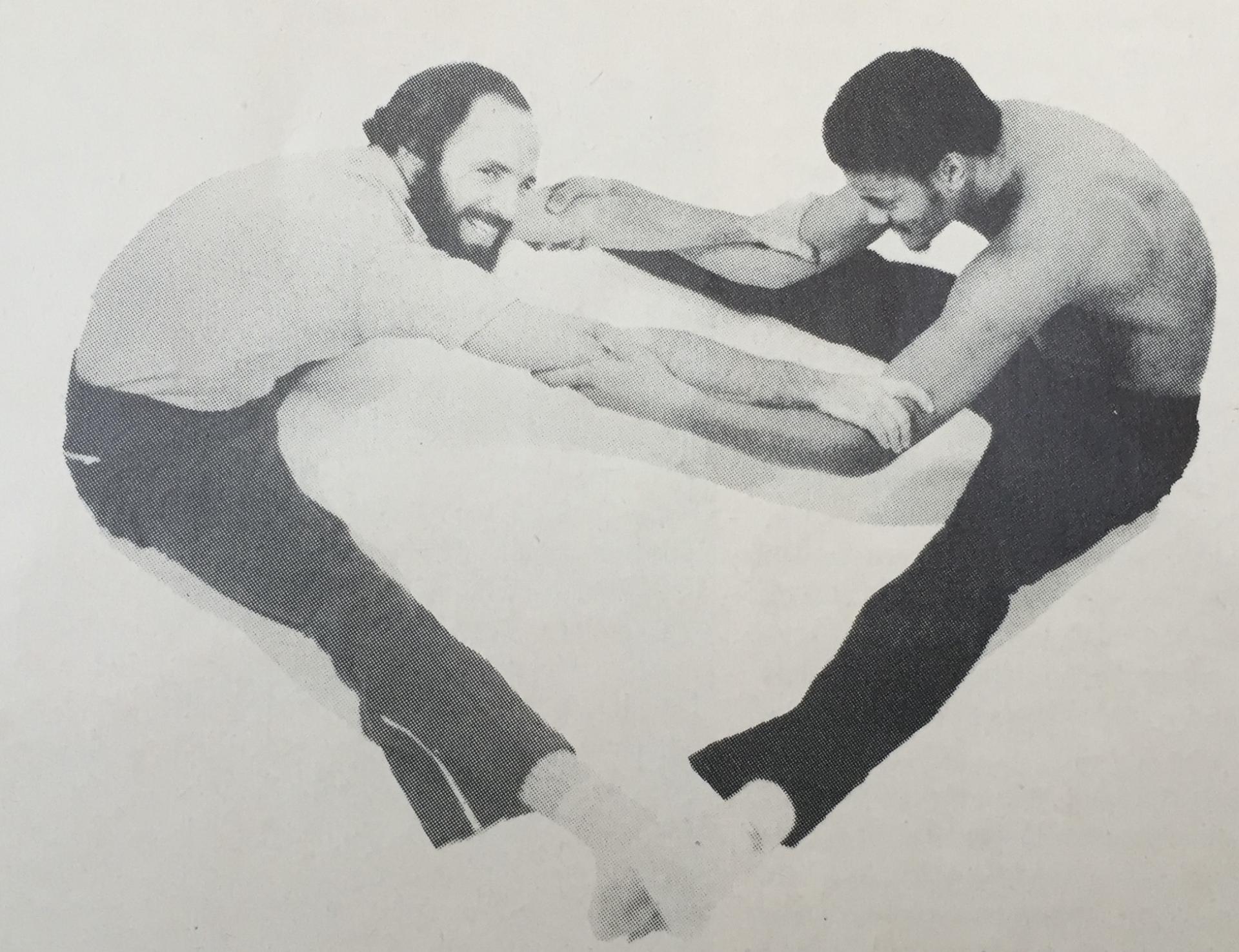 Dr Mark Tager (l) works out with NBA basketball star ___ of the Portland Trail Blazers
