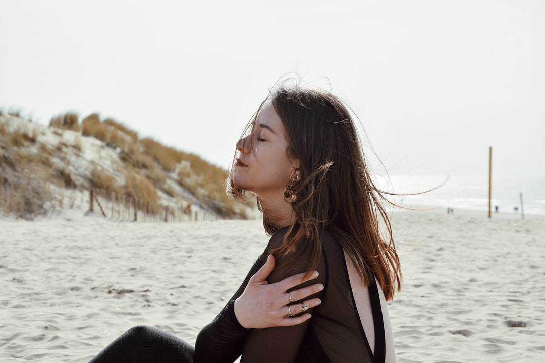 peaceful looking woman at the beach