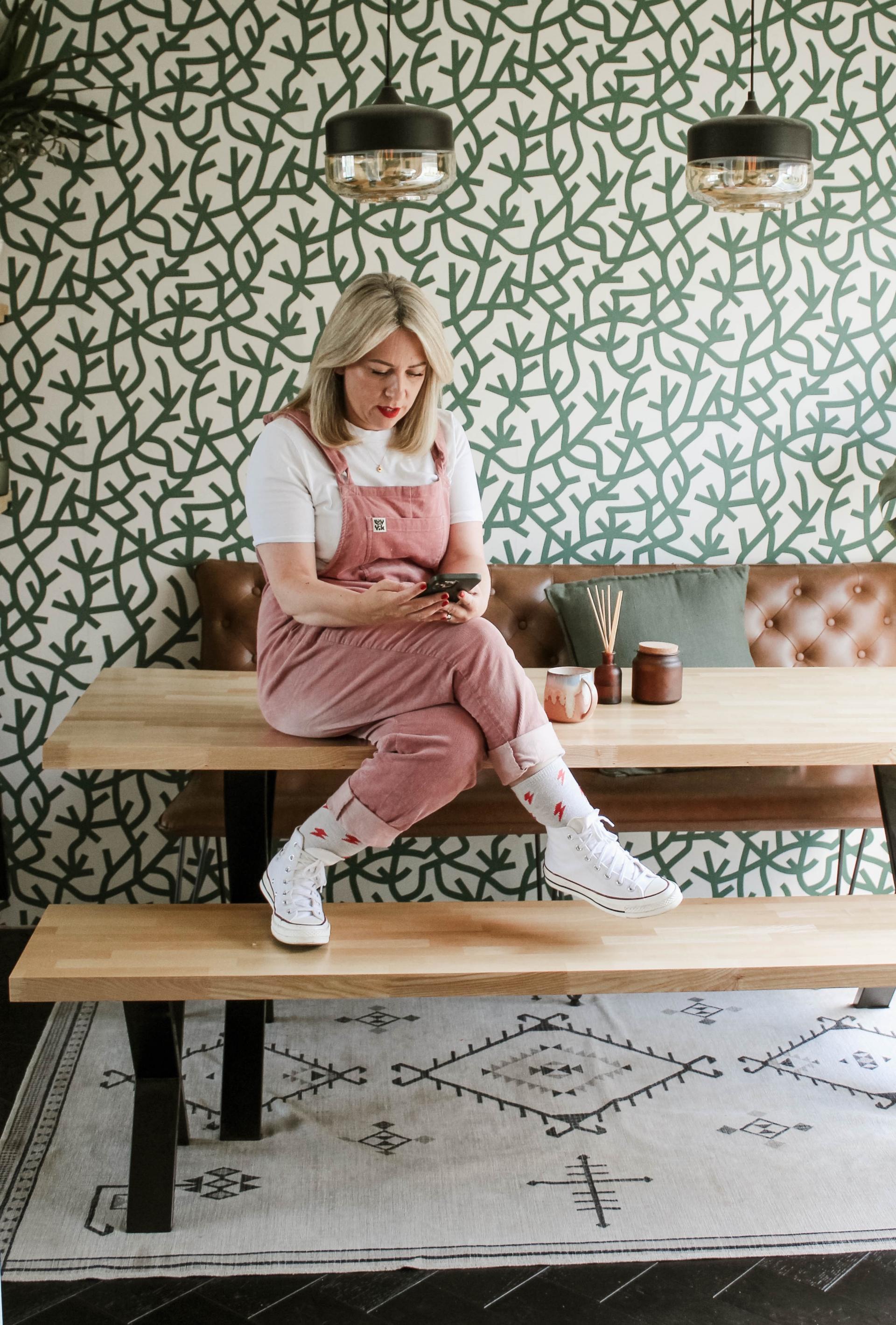 hair salon owner Vivienne Johns working in a cute coffeeshop