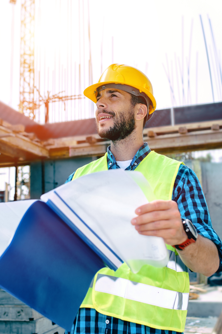 Construction Worker looking at building plans