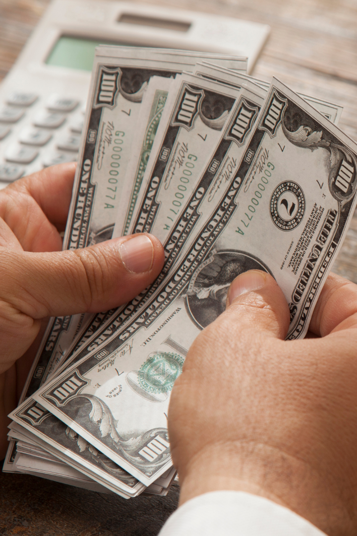 Calculating money close up