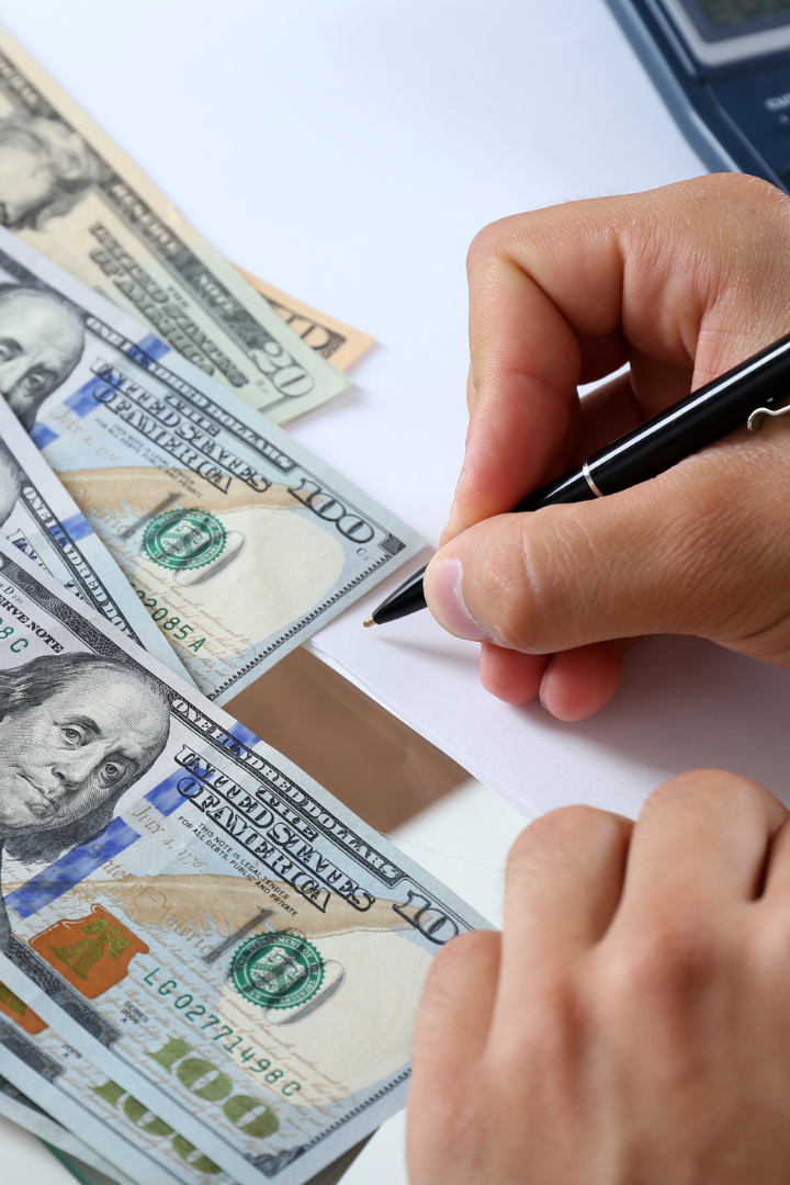 Calculating money close up