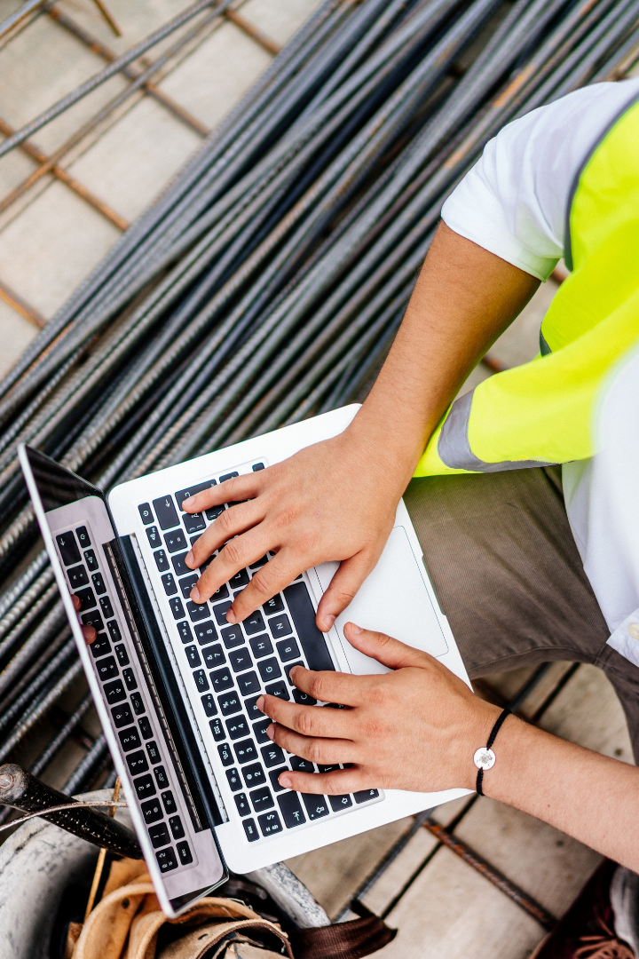 Construction owner with a laptop