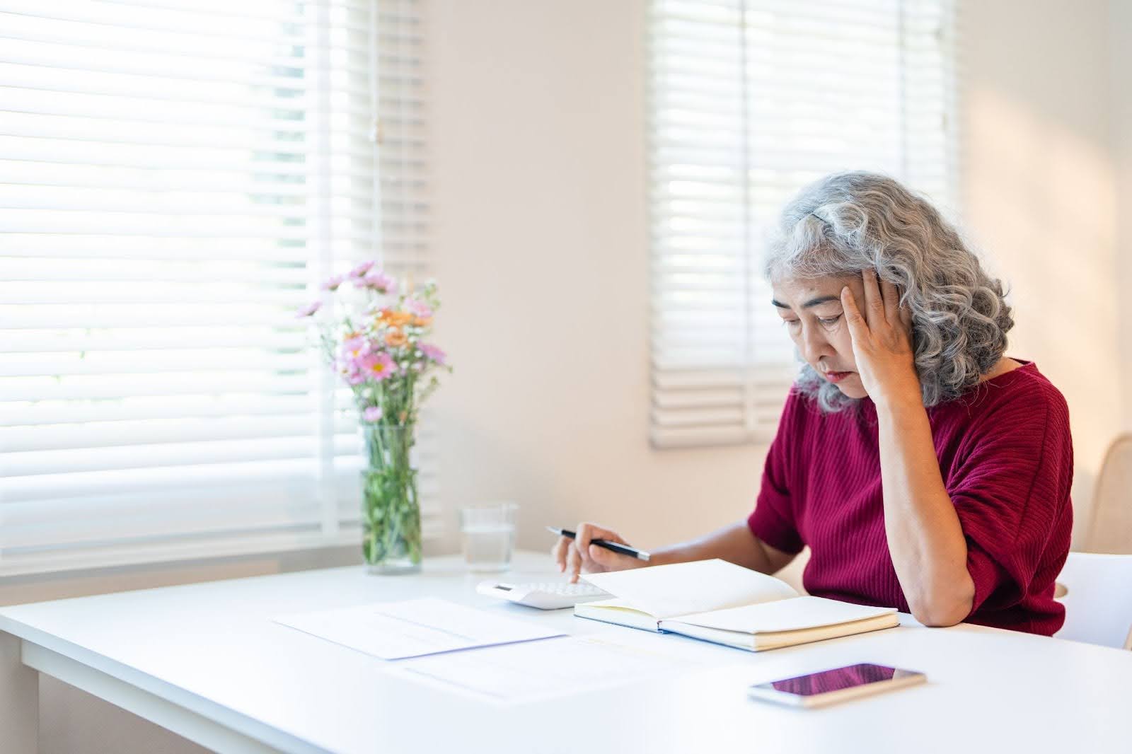 a senior woman trying to understand and calculate taxes on annuities