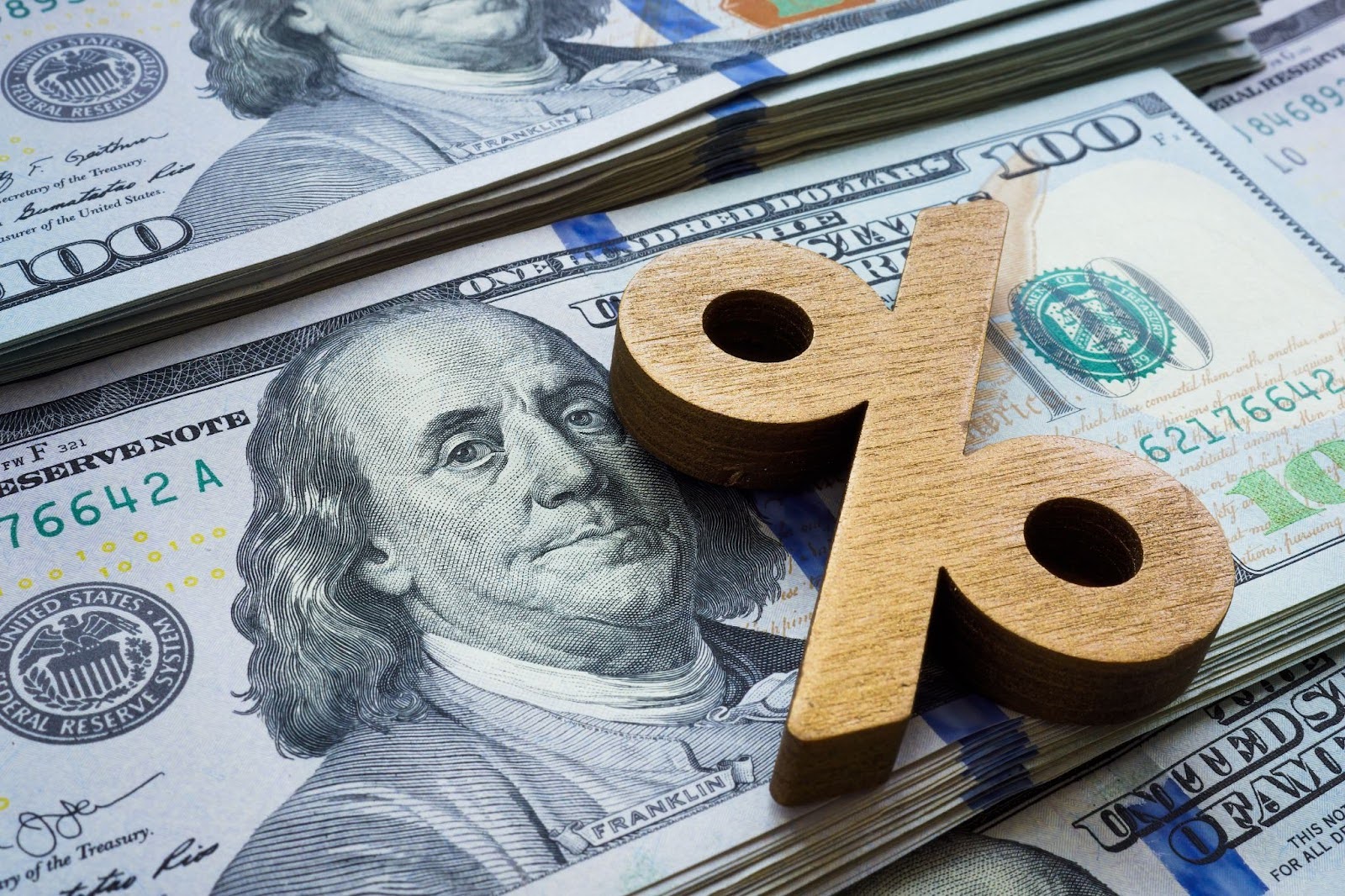 a percentage sign on dollar banknotes