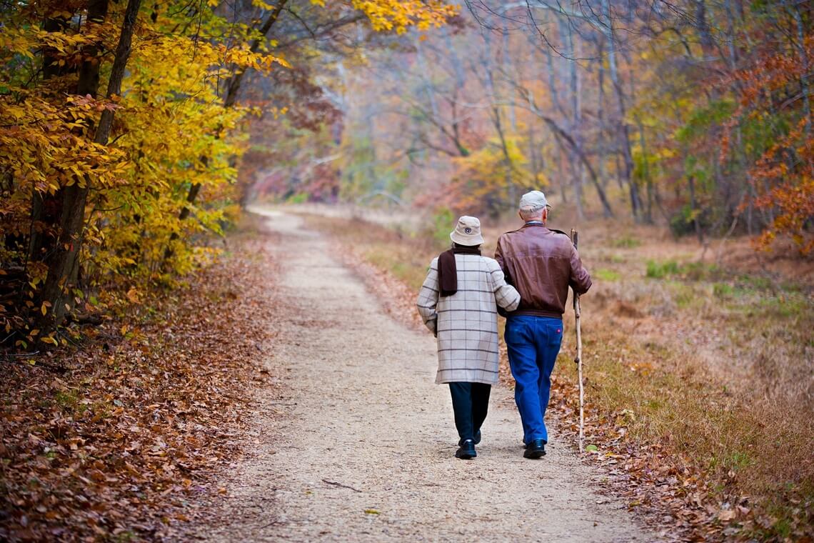 two people sitting on a bench