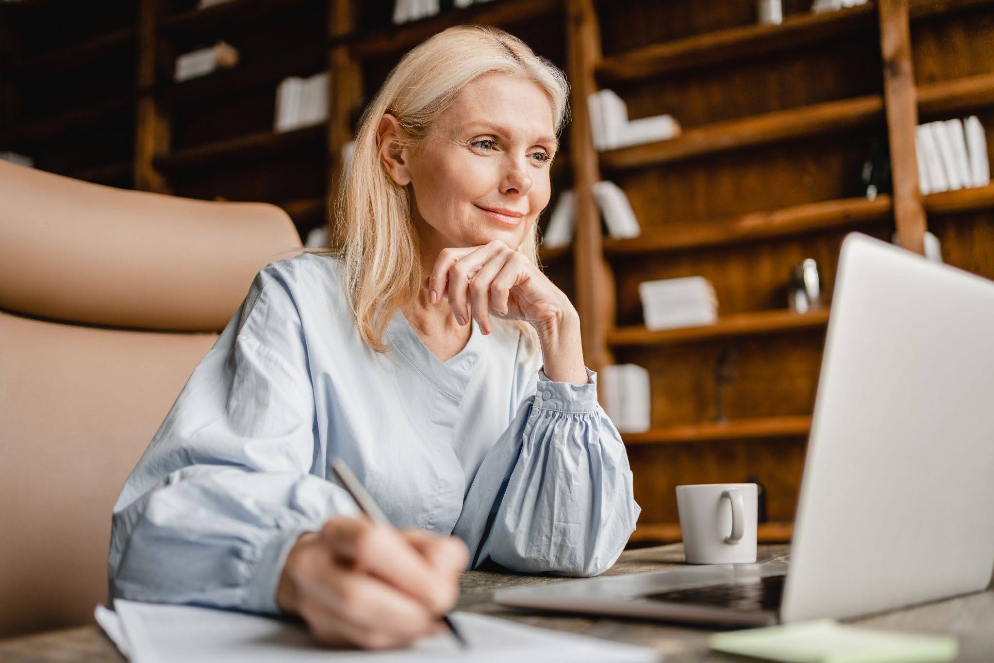 a senior woman checking her retirement savings