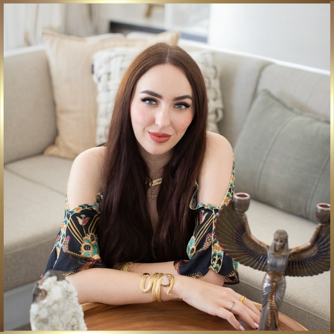 stylish Athina Bailey wearing a black dress, her long hair adding to her allure.