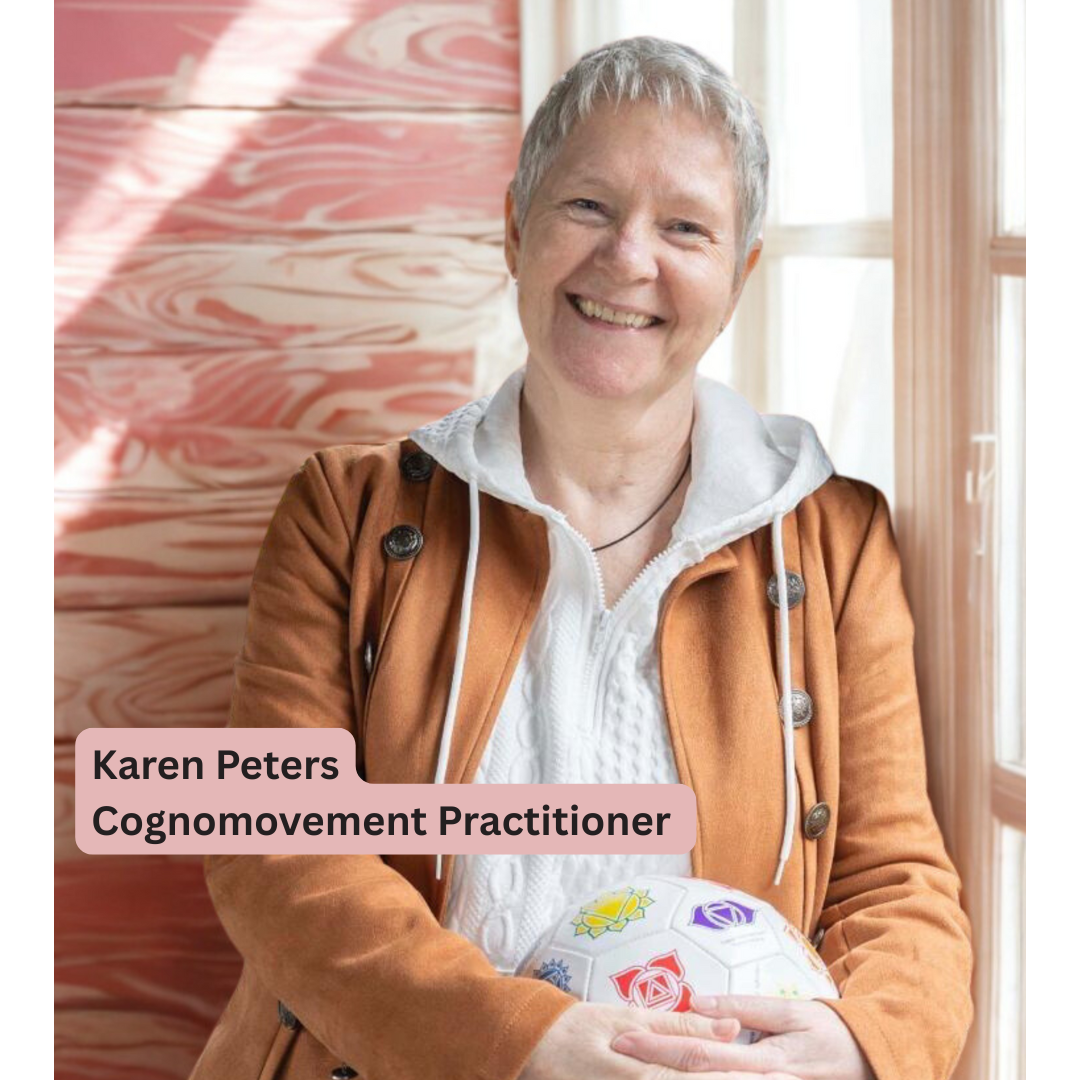 Karen Peters, Cognomovement coach, holding the Cogomovement ball