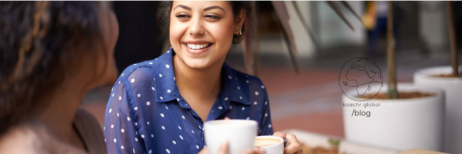 Woman meeting career coach for a casual coffee
