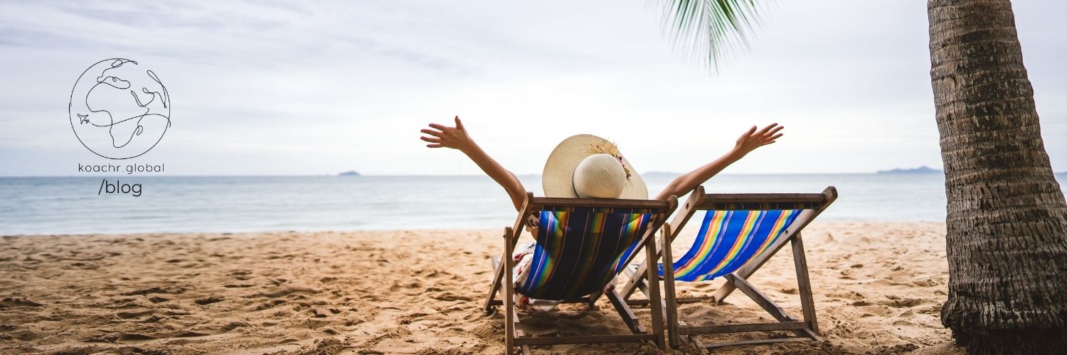 Good person relaxing on the beach during a break from doing good work in the world.