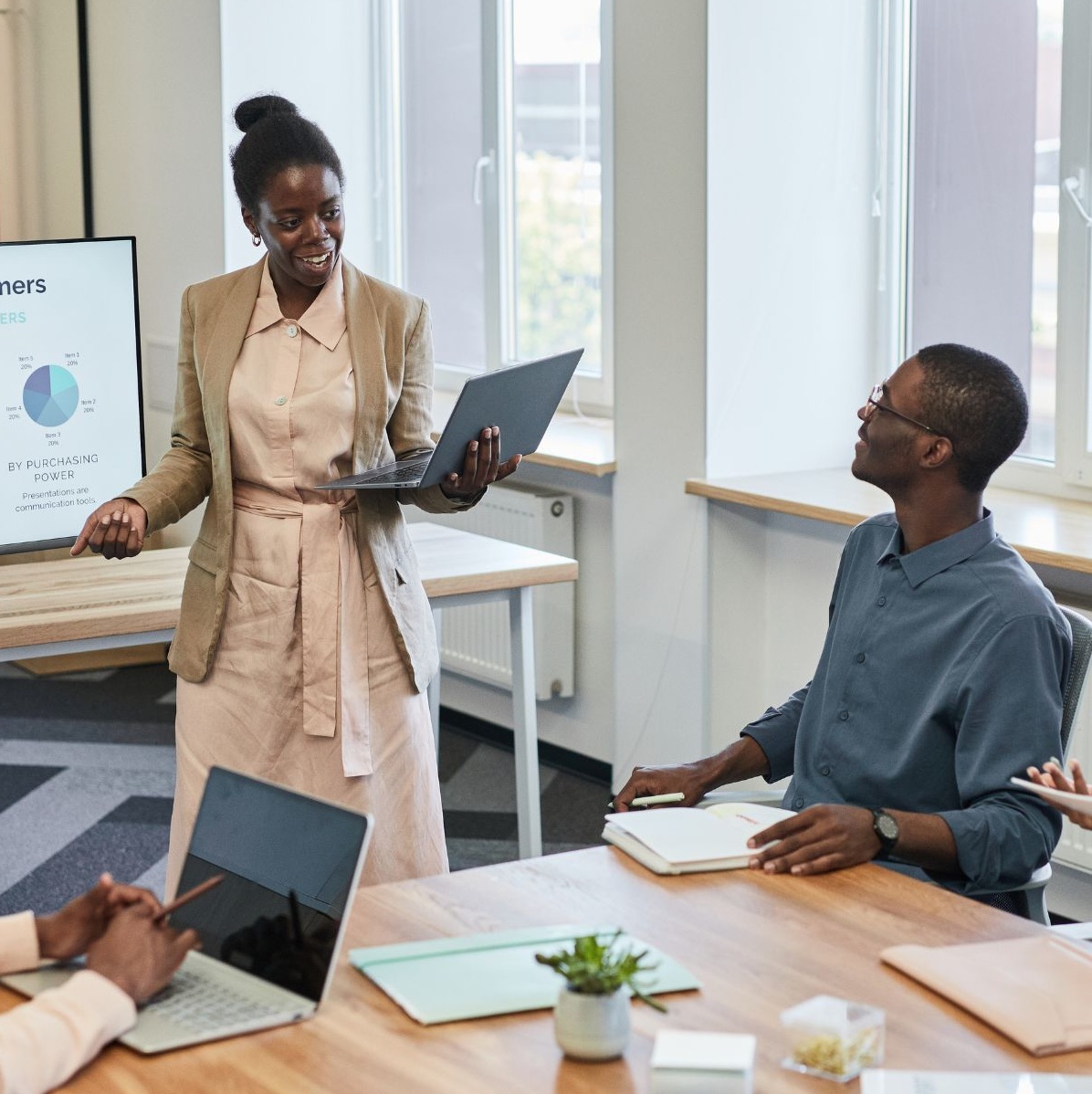 Woman leading a meeting for colleagues
