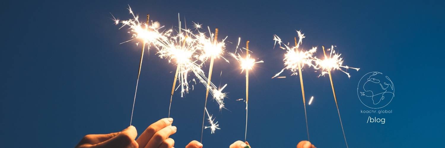 Hands holding New Years sparklers