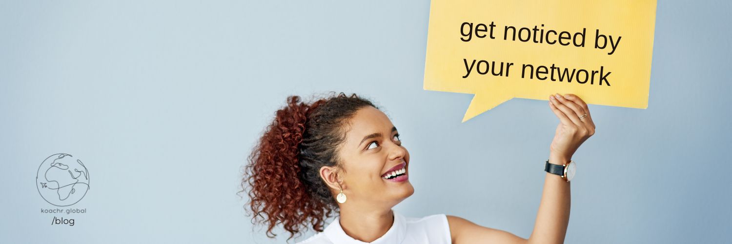 Woman holding up a comment bubble that says "get noticed by your network"