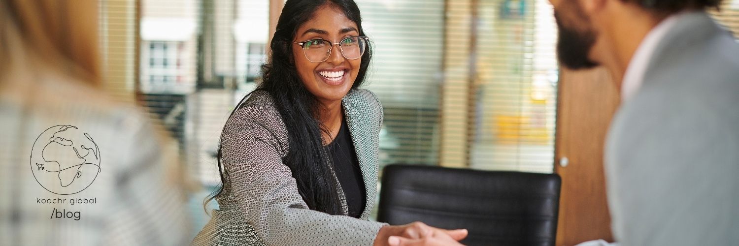 Eager applicant greeting interview panel
