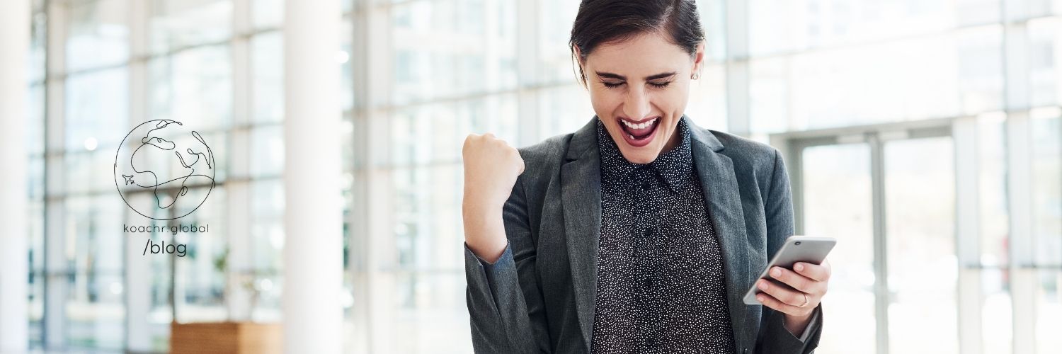 Woman celebrating UN job search success