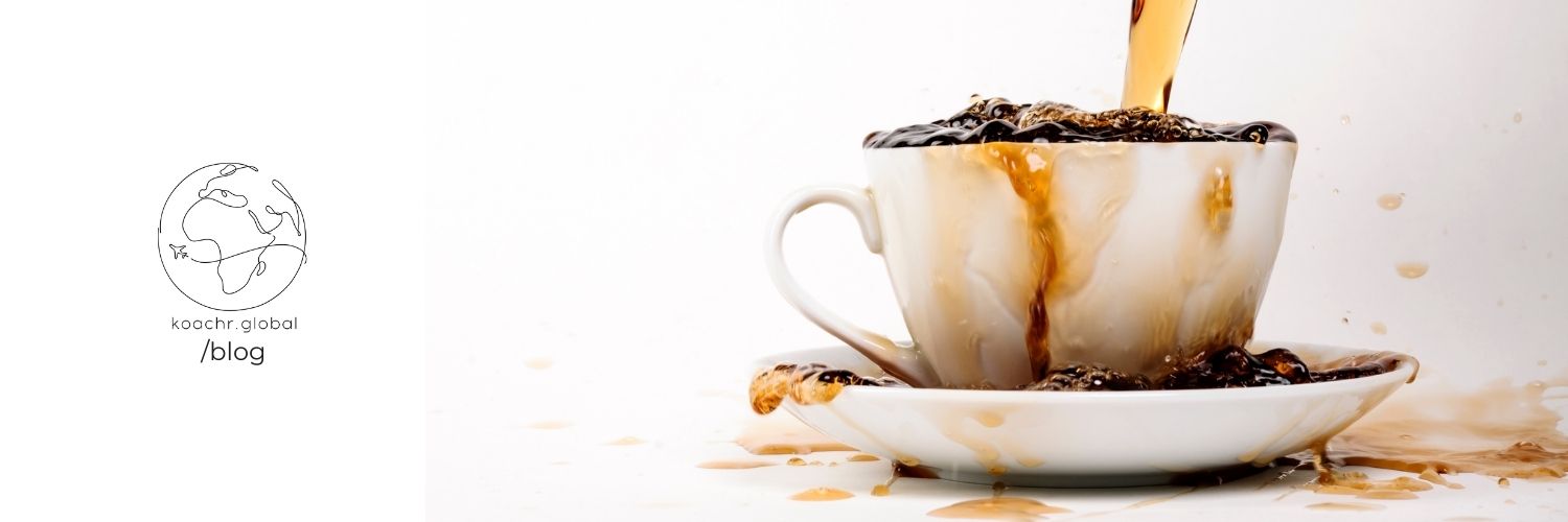 Overflowing coffee cup - depicting that there can be too much of a good thing