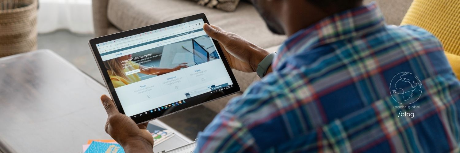 Candidate looking at LinkedIn on a tablet.