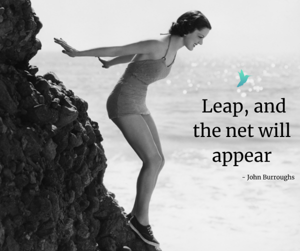 Group of retreat participants gathered at a fire circle in the evening