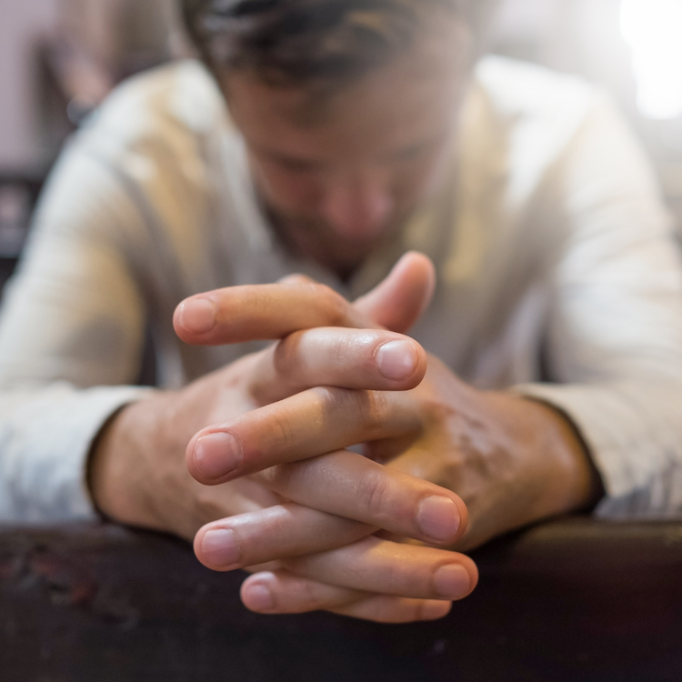 man praying