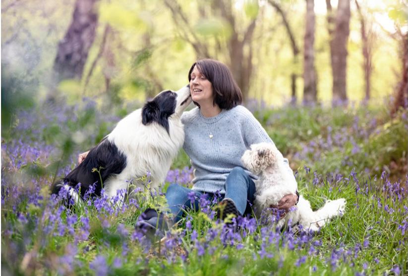 Lady with border collie and shih tzu