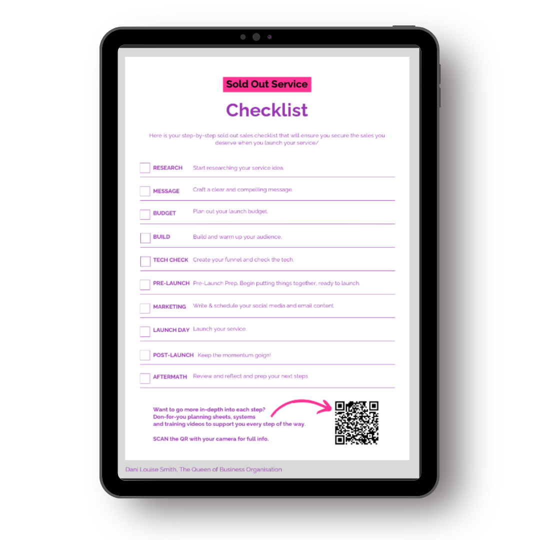 Dani, female business coach and mentor with blonde hair with pink ends, holding a coffee