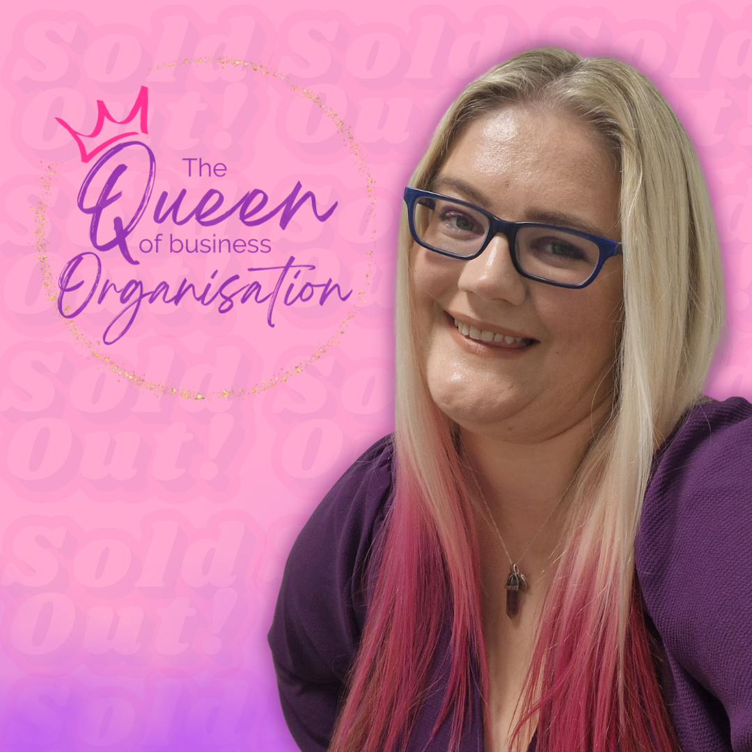 Dani, female business coach and mentor with blonde hair with pink ends, holding a coffee