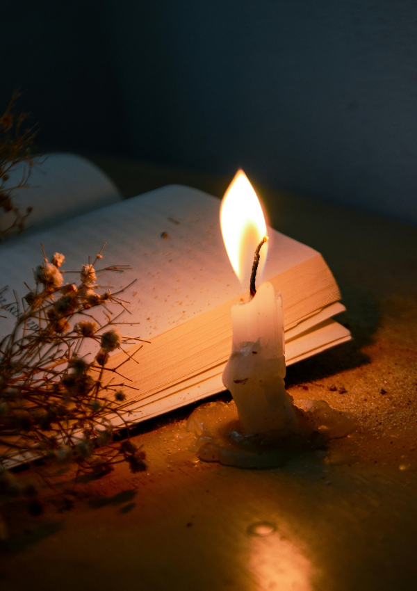 Sparking the Flame - Free Writing Guide: Book with candle and flame