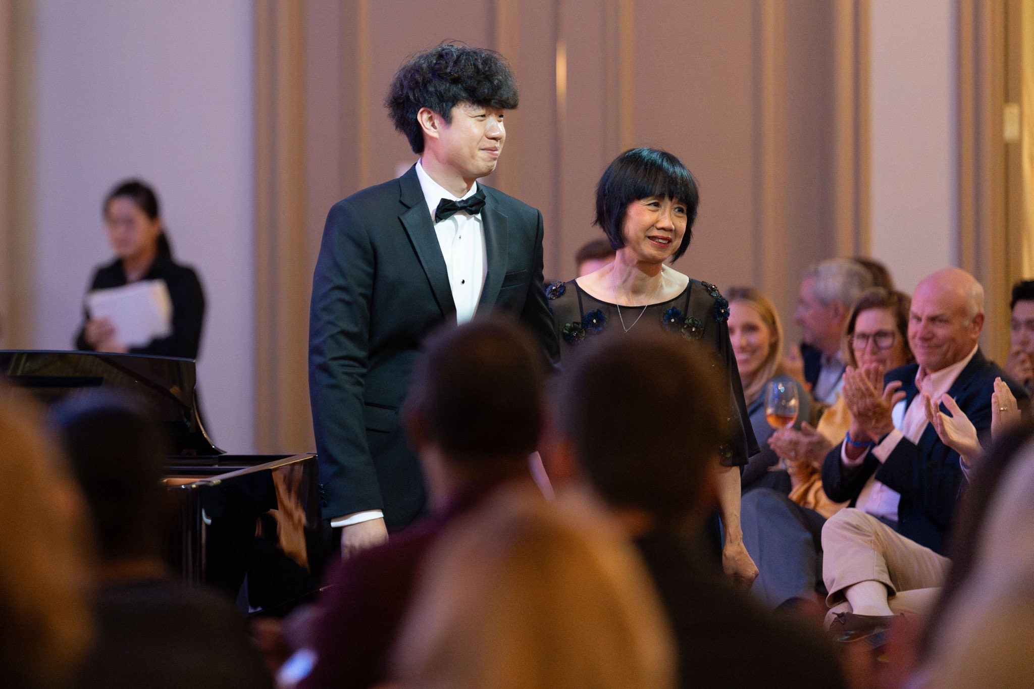 Michelle and Christopher Kuo of Two Piano Journey performing a benefit concert at Carnegie Hall’s Zankel Hall
