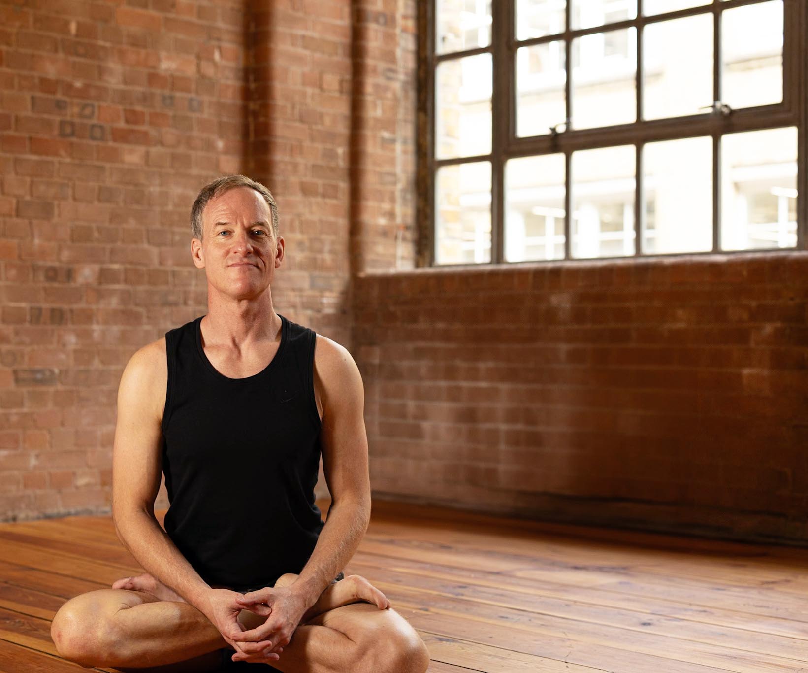 Jason Crandell in Lotus Pose