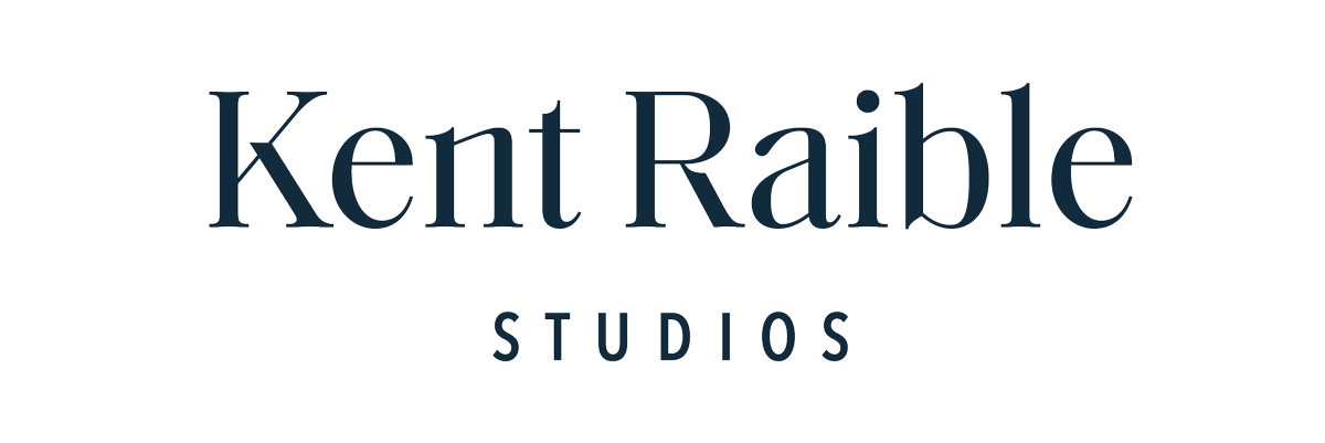 Kent Raible Studios white logo