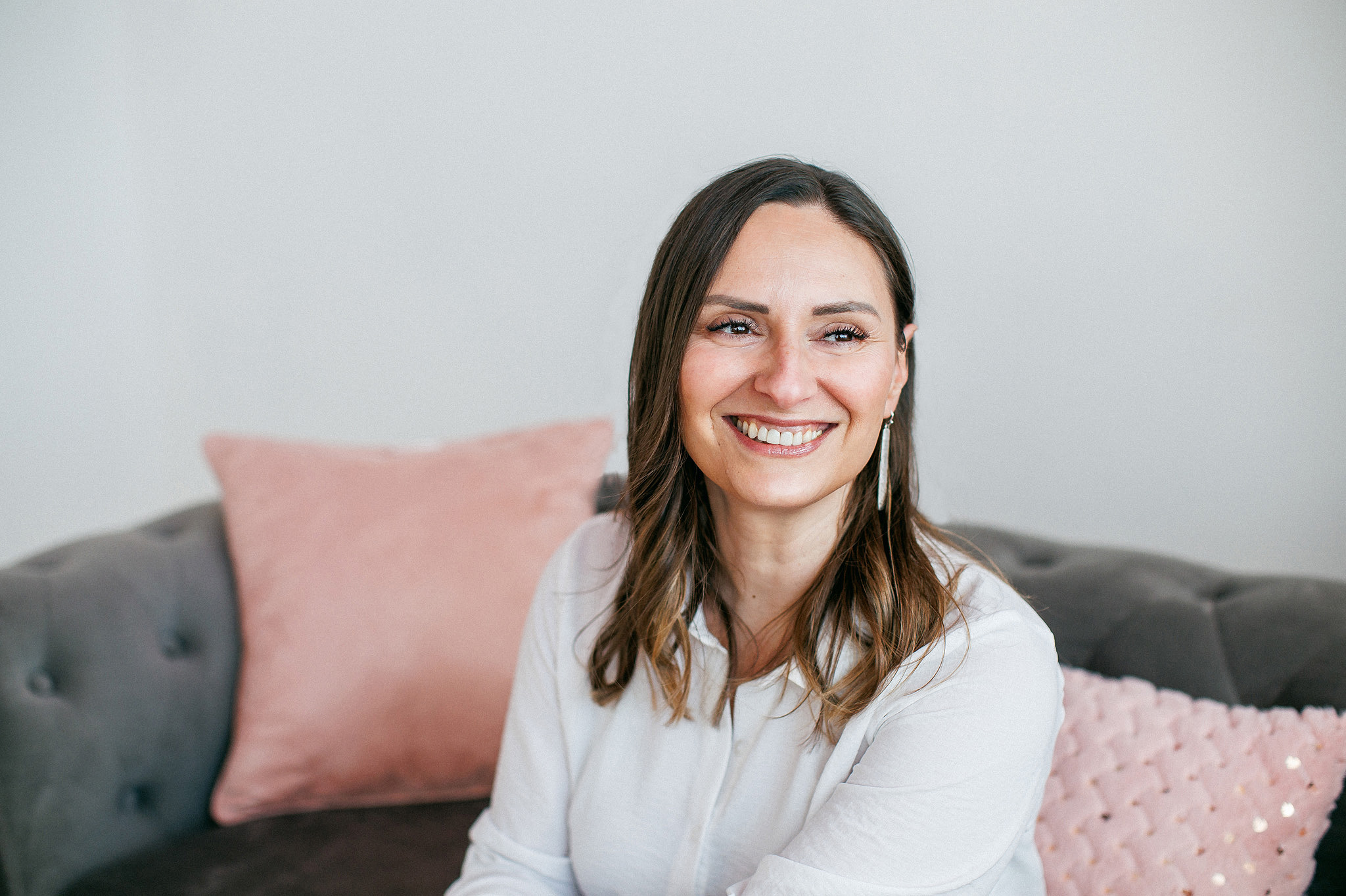 Female coach smiling.