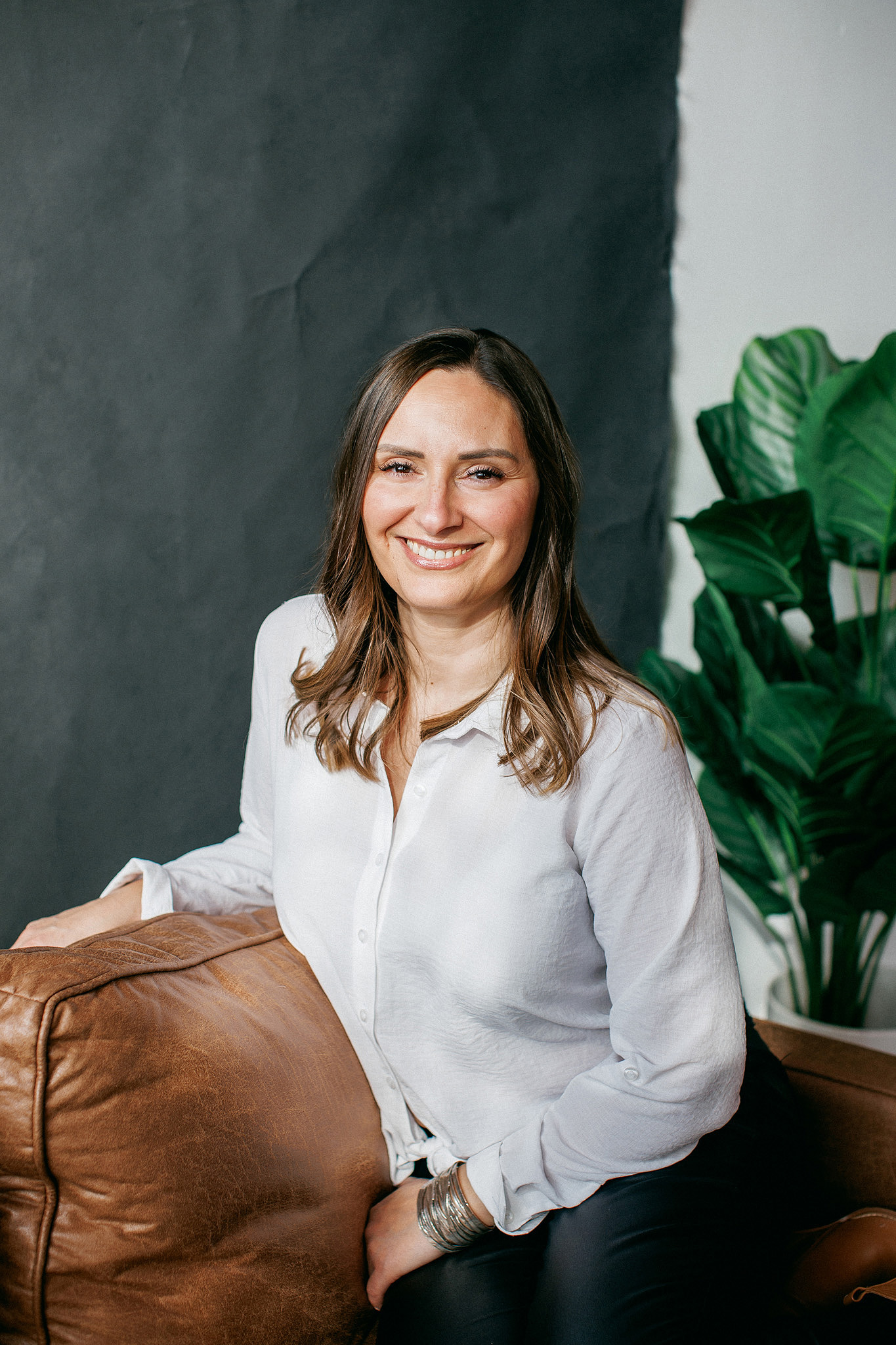 Intimacy coach smiling.