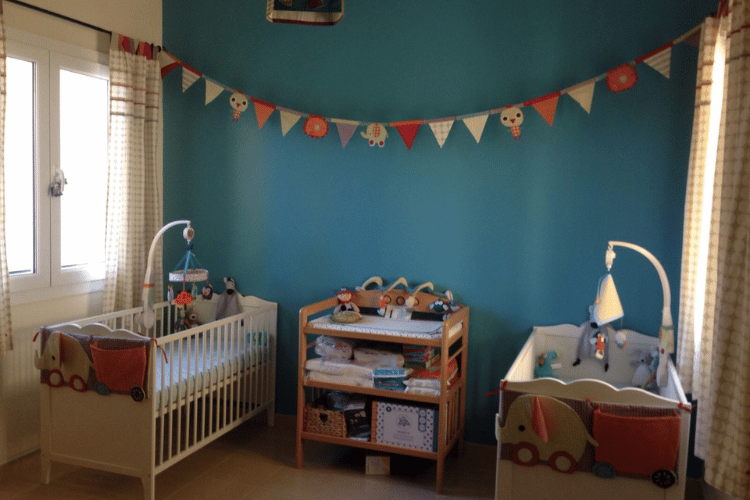 photo of a nursery with twin cots