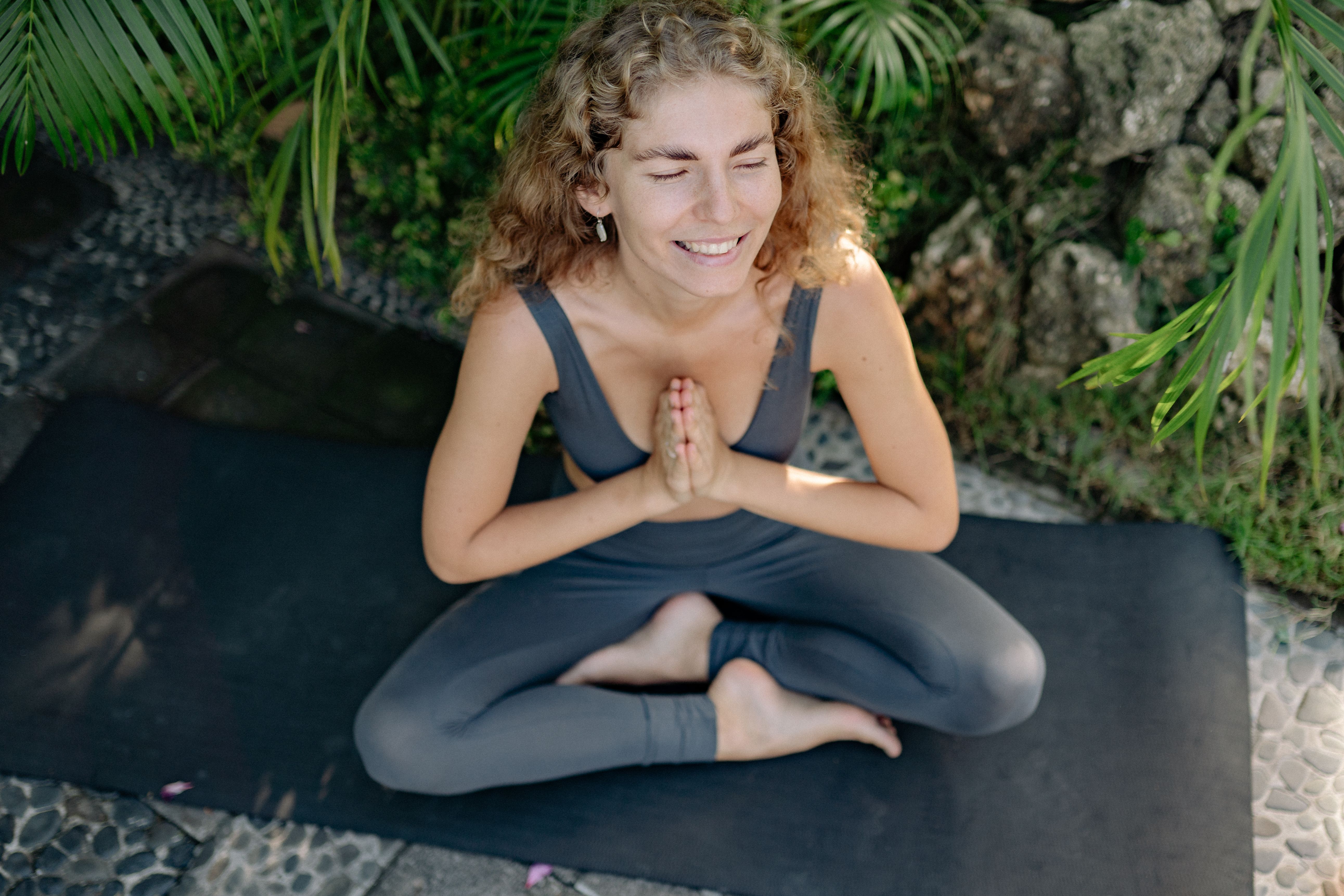 Founder meditating or resting outdoors — protecting energy while building a business sustainably