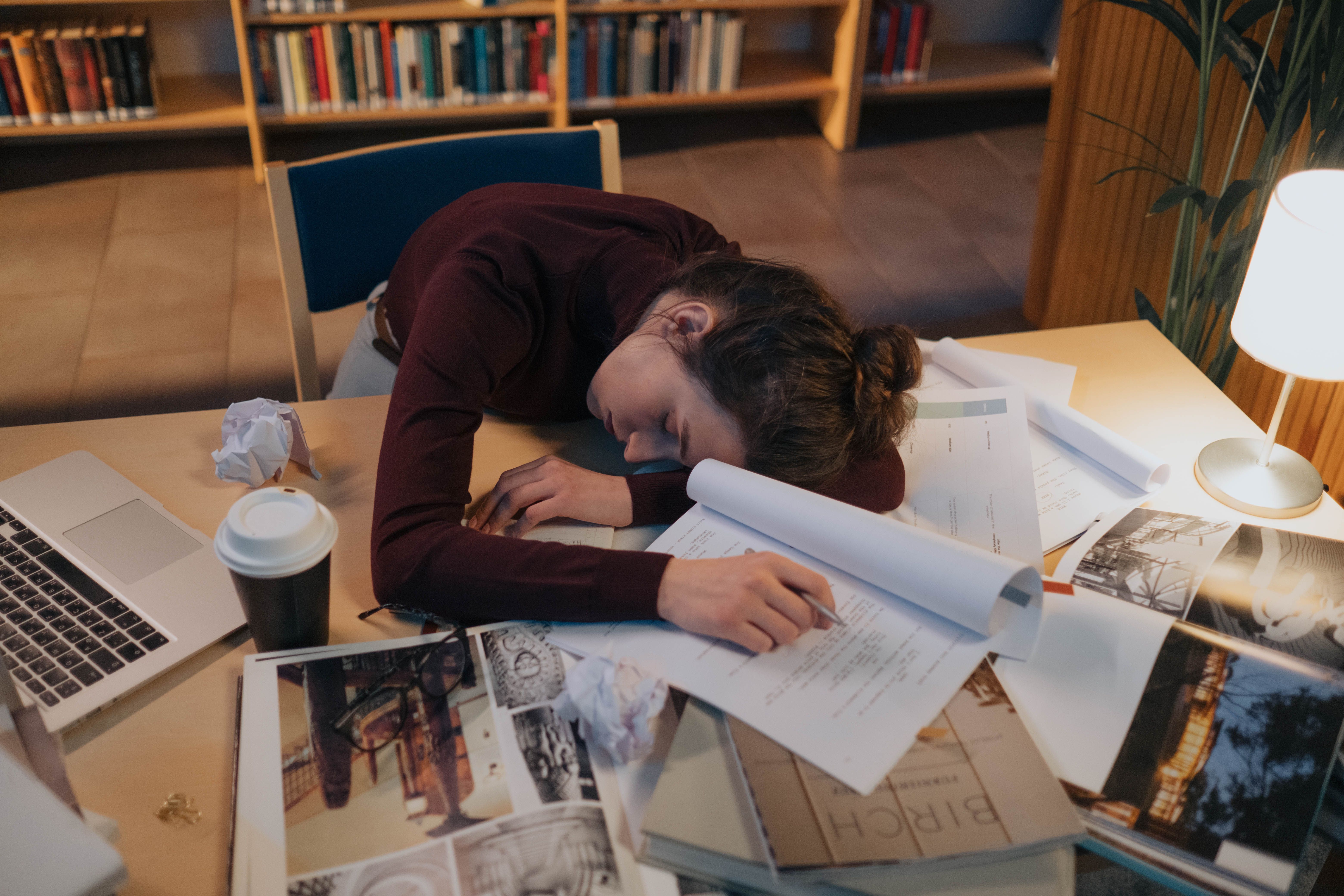 Exhausted founder at desk late at night — the hidden cost of hustle culture on health and business