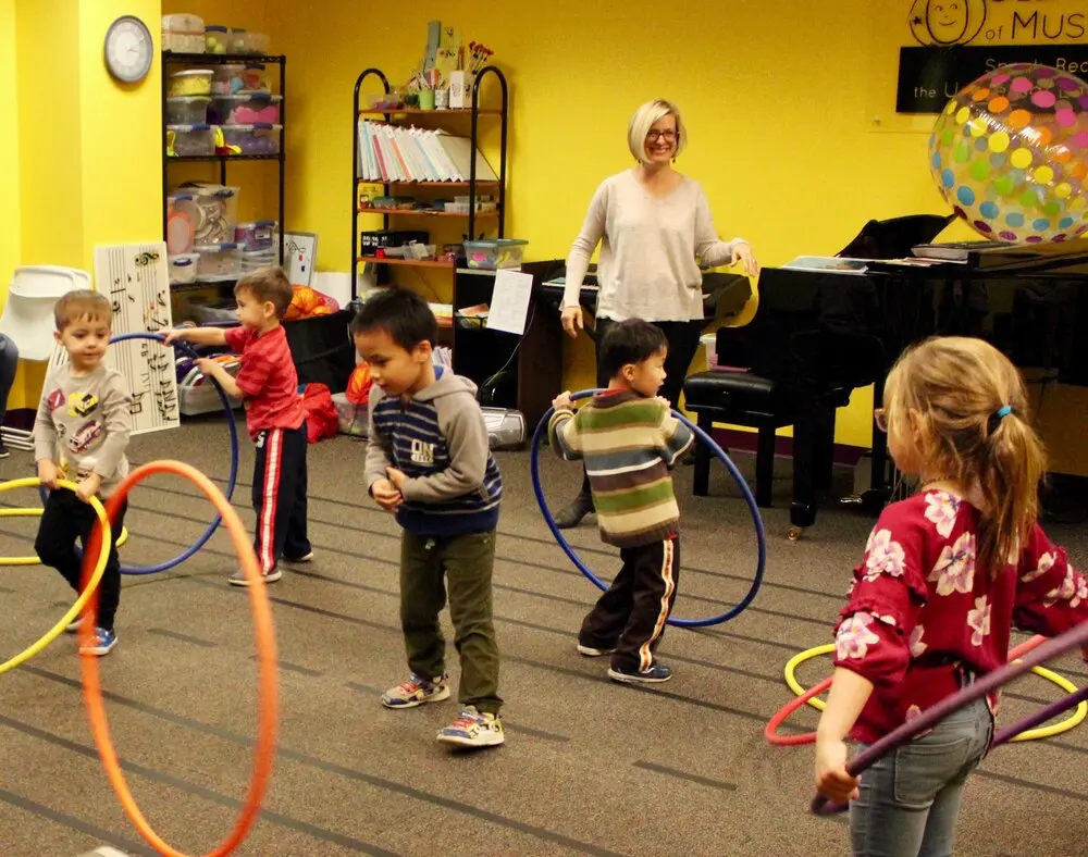 Children enjoying music activities at OSM