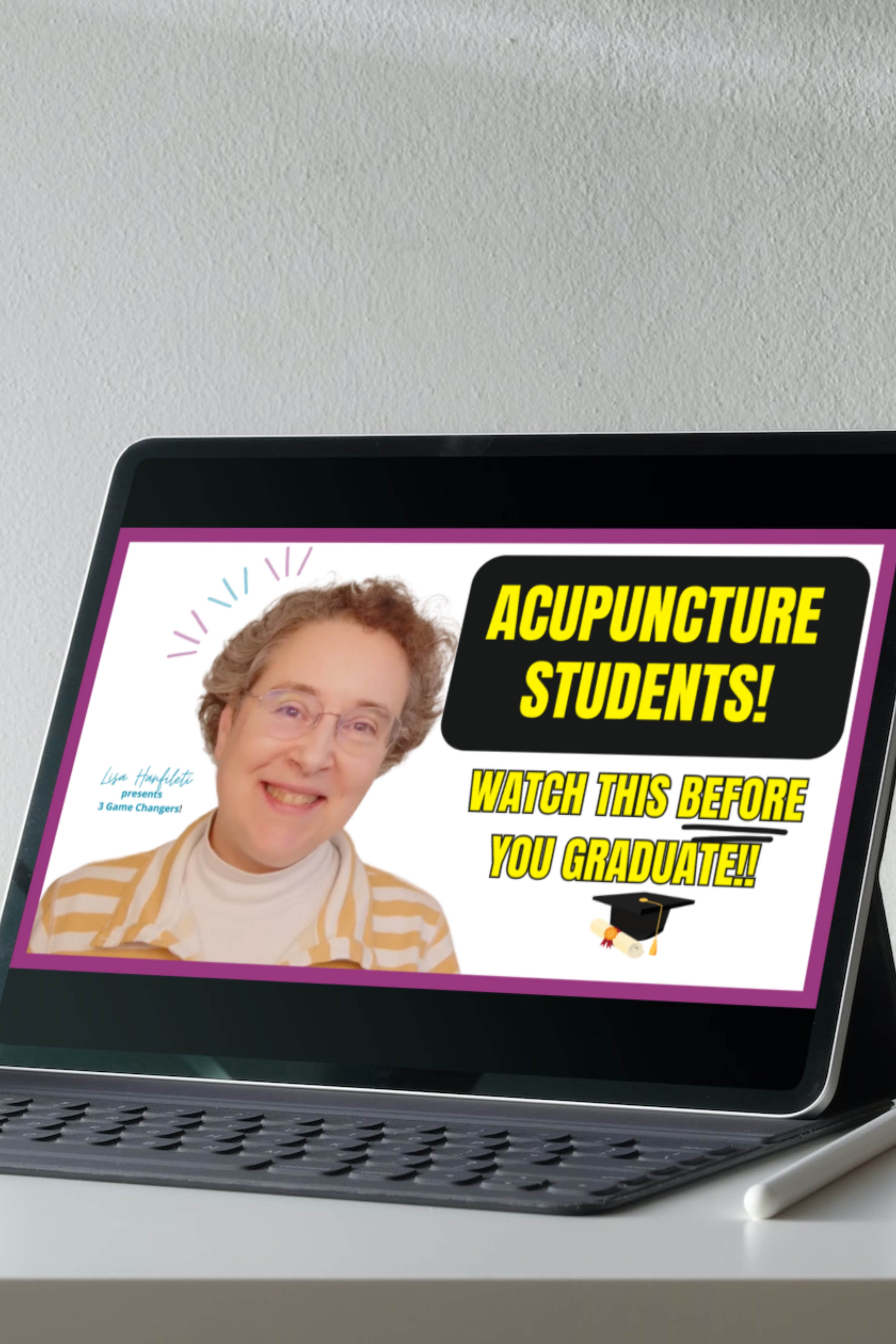 Tablet showing picture of video training ready to click play