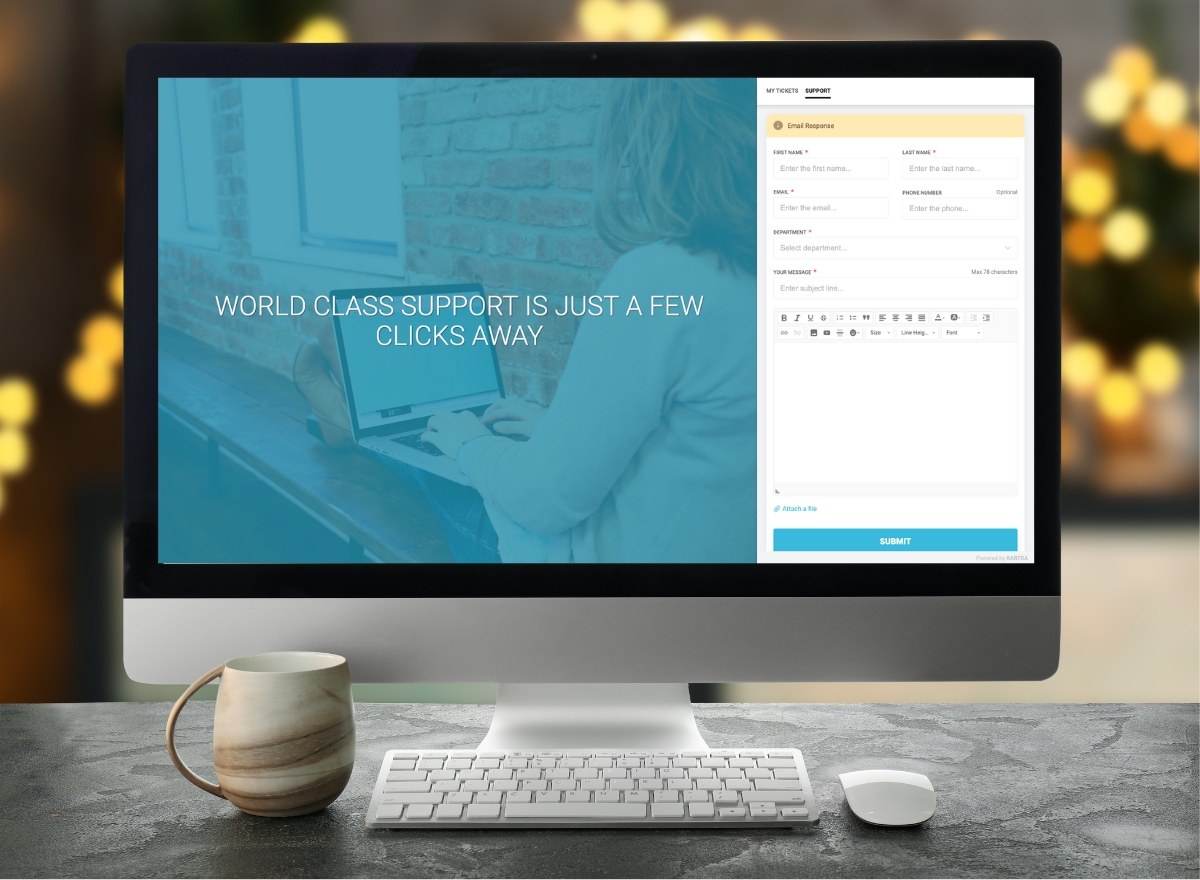 Big computer screen on desk showing contact form