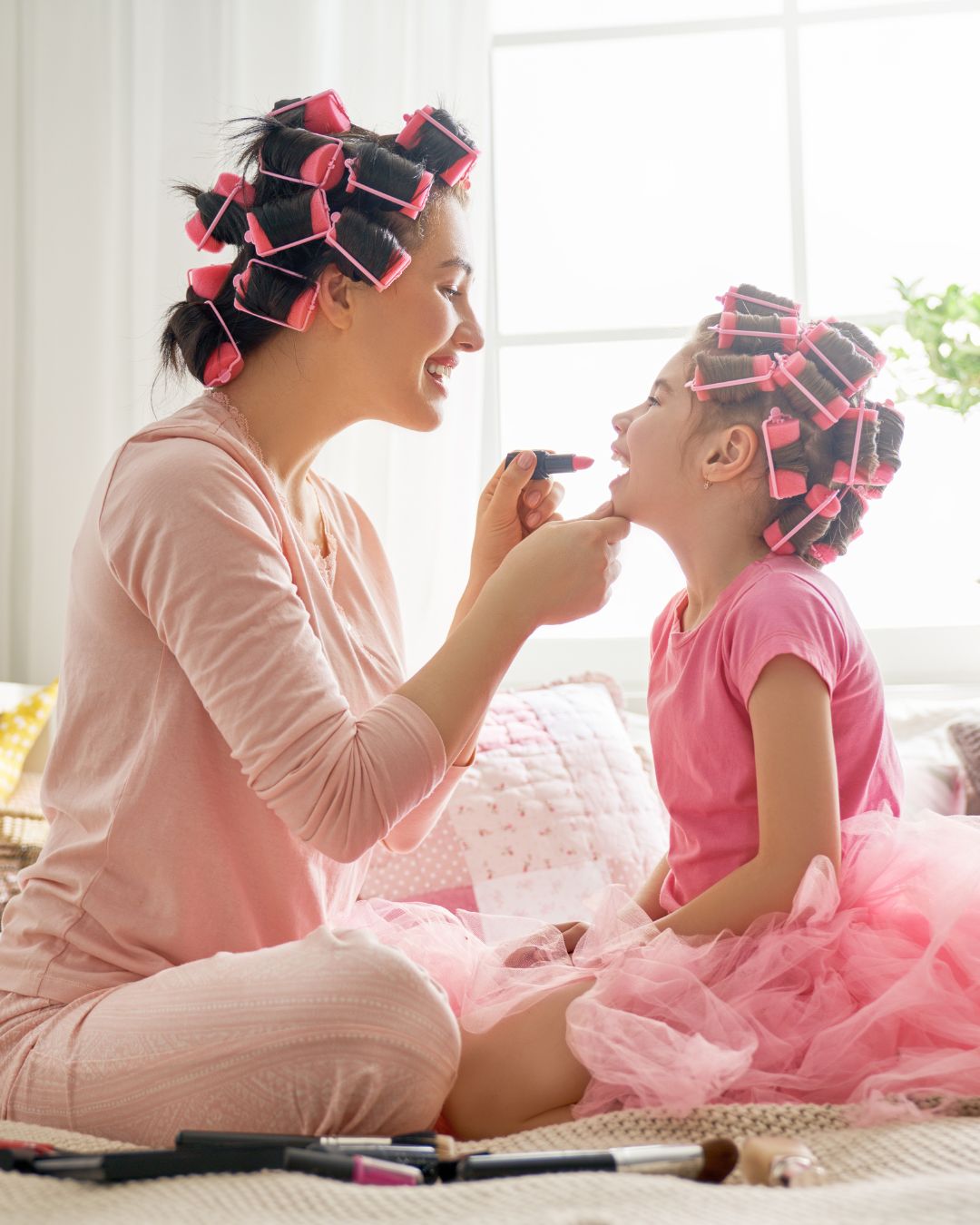 mom and daughter playing with rollers