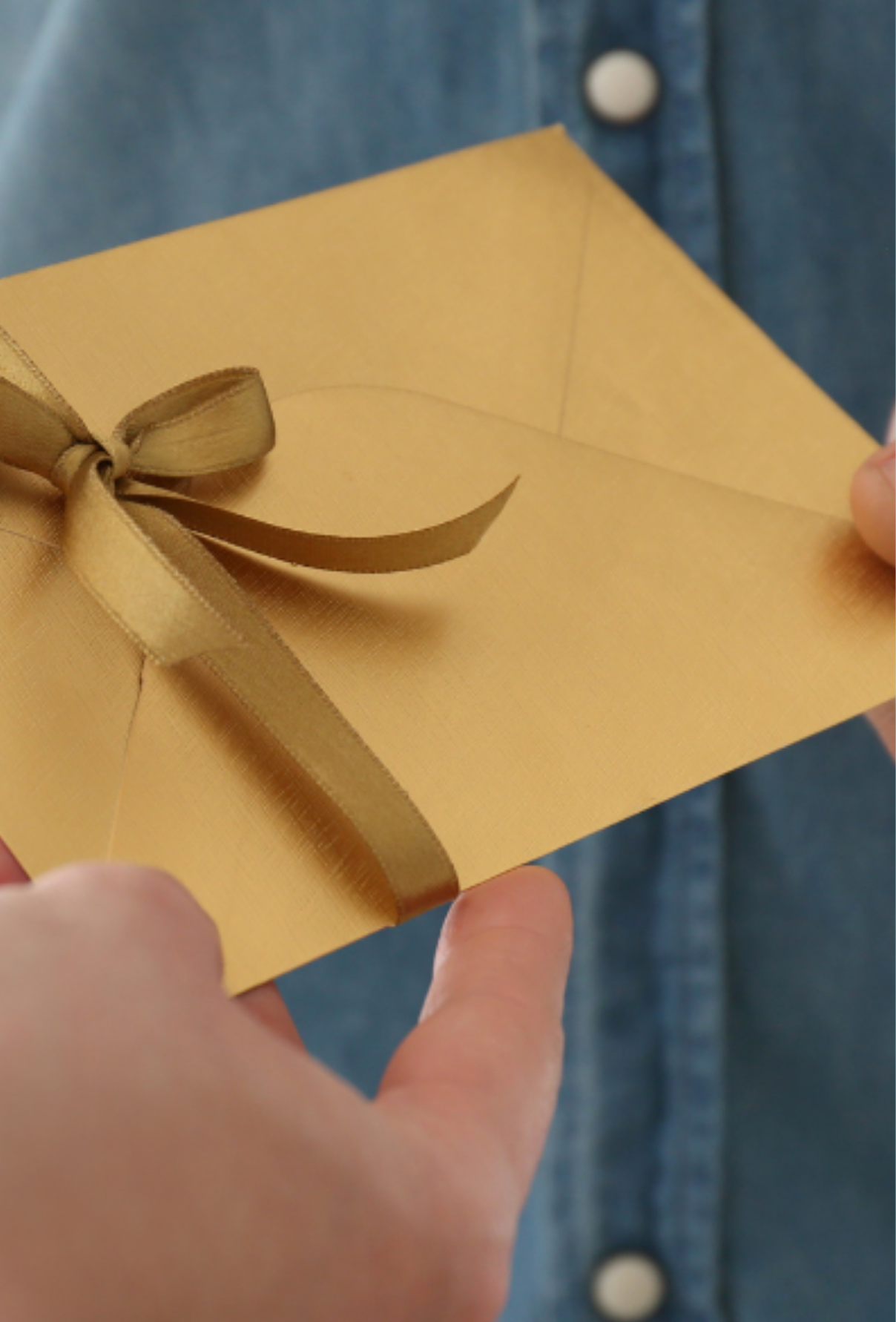 Image of a black envelope with a butterfly inside signaling transformation