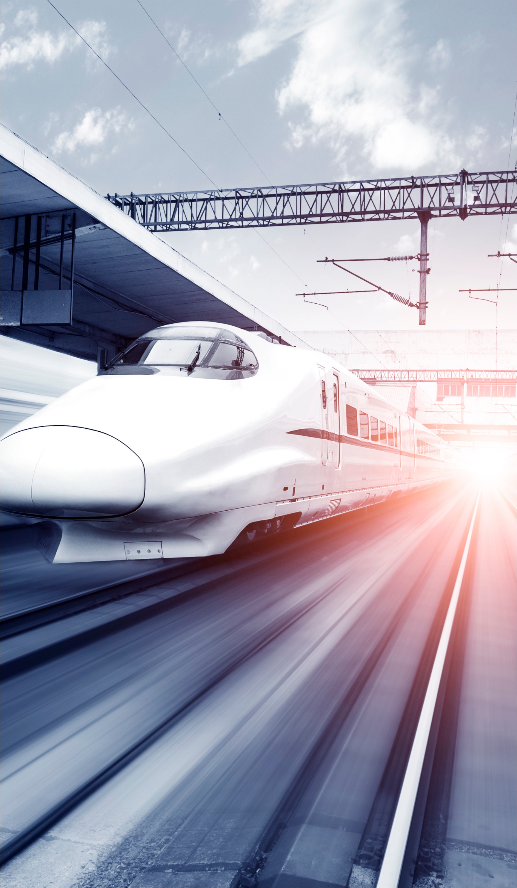 Image of a train moving fast on the tracks