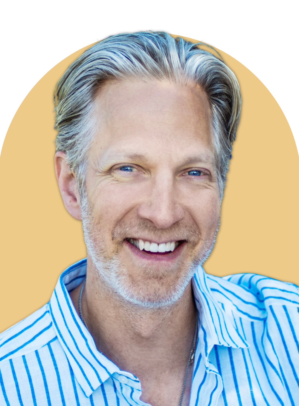 Close-up portrait of a person smiling with a soft, friendly expression