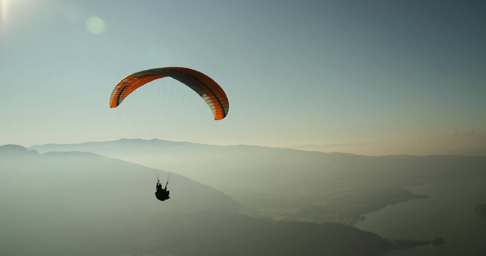 Paragliding, illustrating breaking down internal barriers