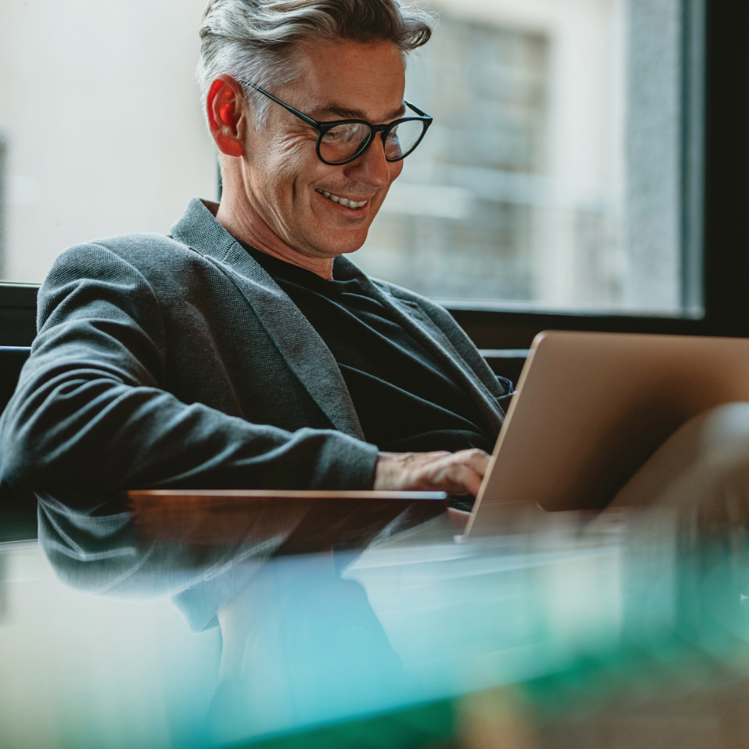 sophisticated man wearing black specs