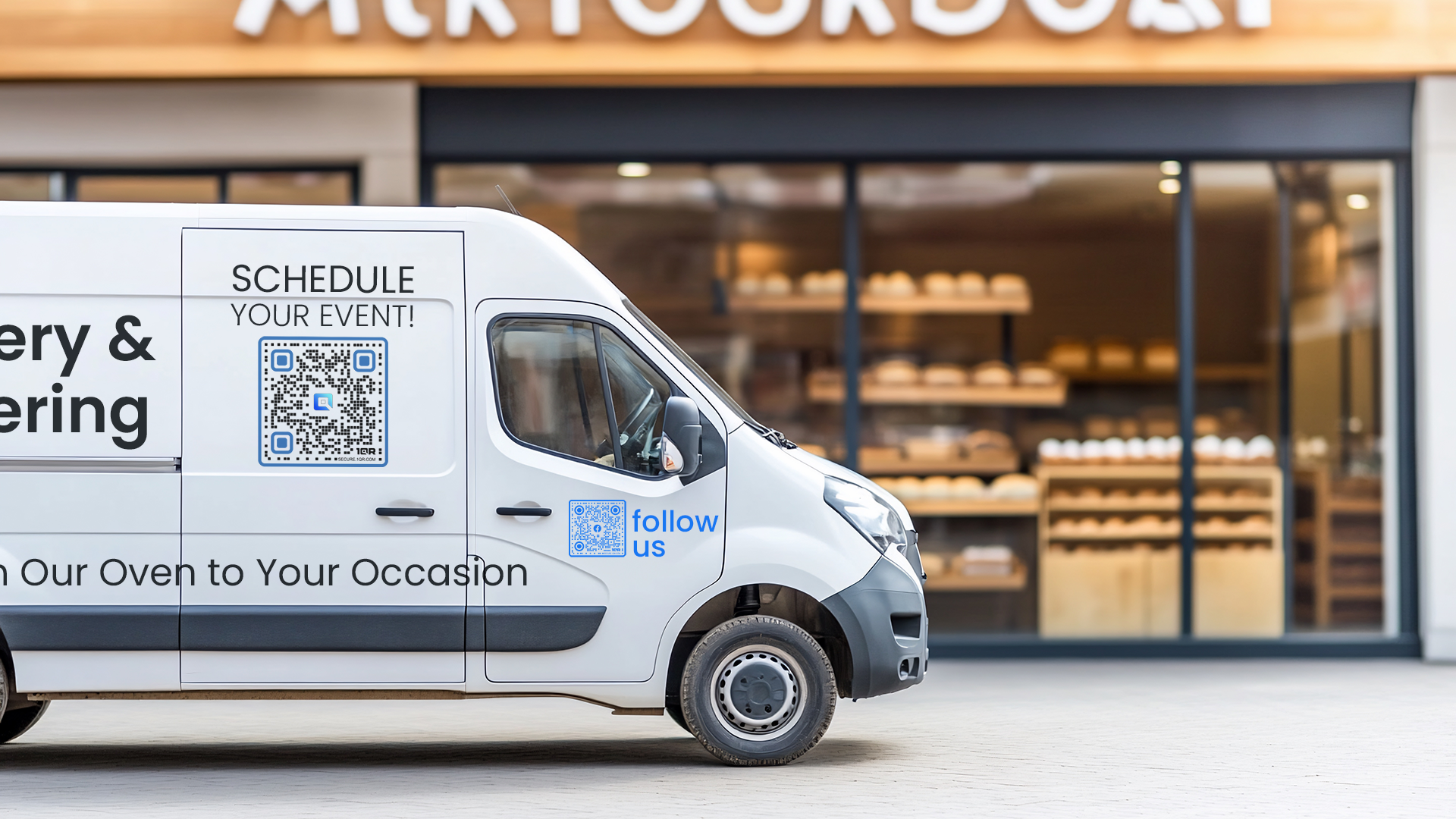 Delivery truck with QR codes for event inquiries and social media parked in front of the bakery