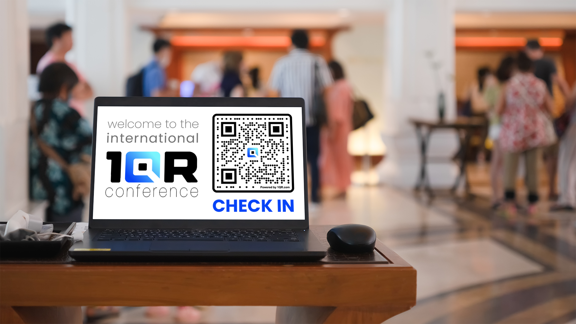 Laptop on a counter displaying a QR code that links to a sign-in process