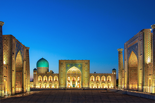 Illuminated Registan Square in Samarkand at blue hour -  Shot on a Raw Tours photo tour in Uzbekistan