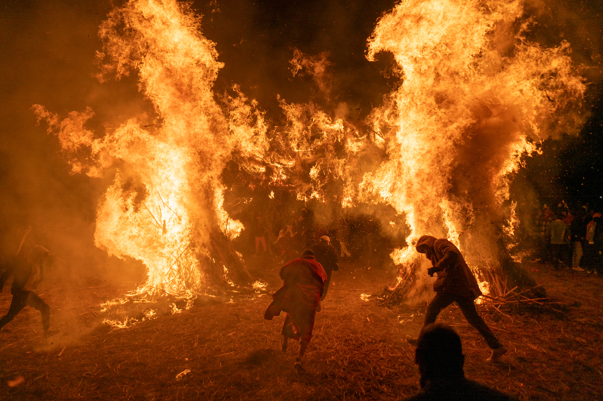 Bhutanese fire ceremony ritual at night during Raw Tours photo tour.